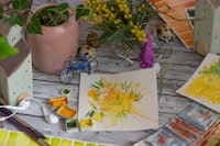 yellow flower on white paper