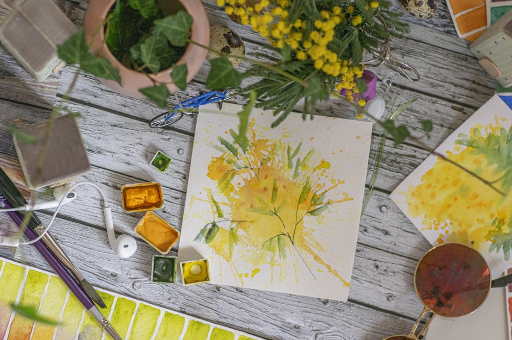 yellow flower on white paper