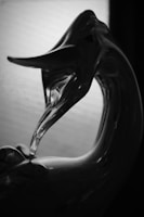 Close-up of a delicate borosilicate glass bunny sculpture with soft natural lighting.