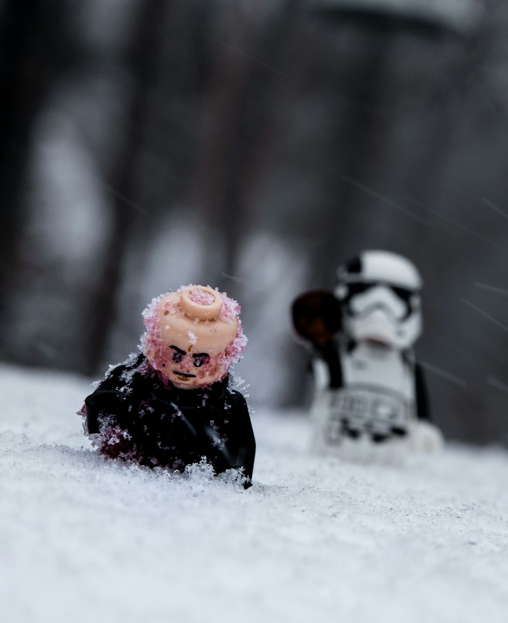 snowman with pink rose on mouth