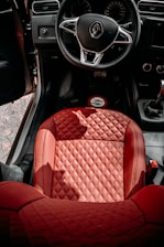 red car seat in car