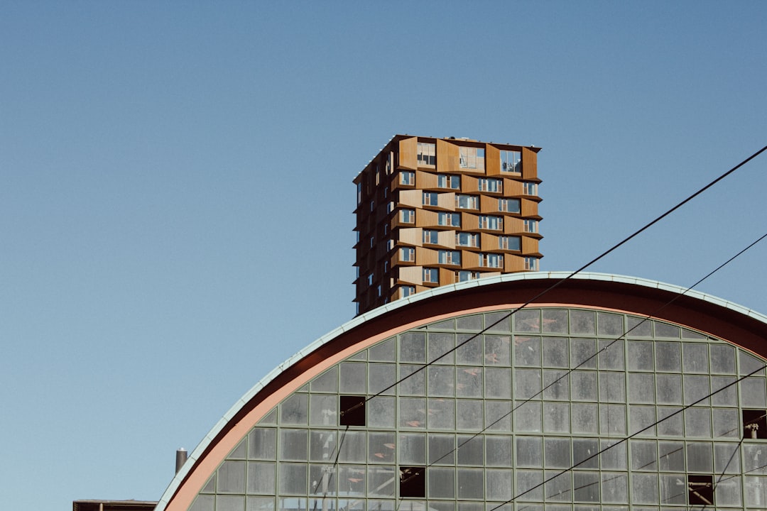 white and brown concrete building under blue sky during daytime