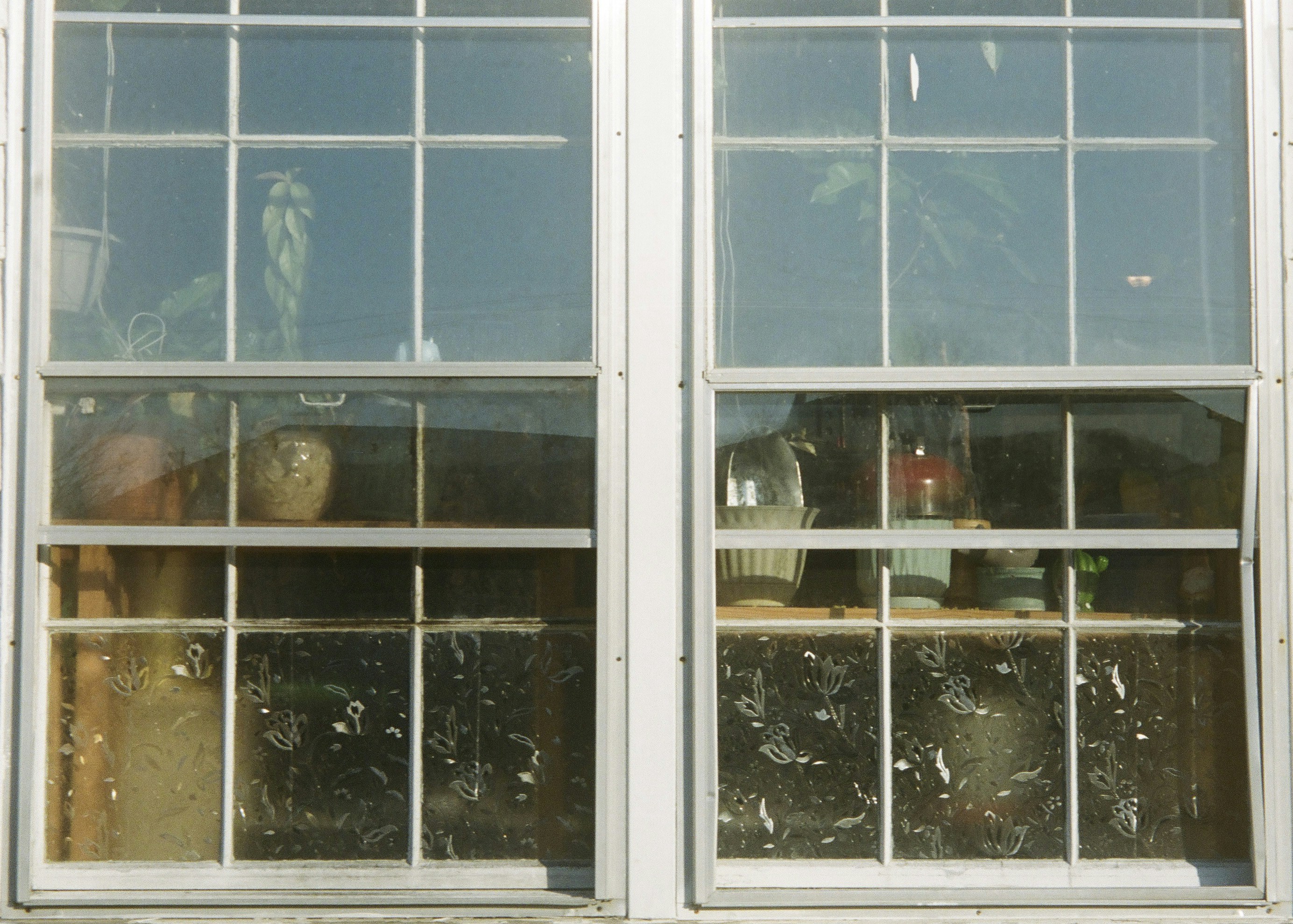 white wooden framed glass window