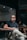 man in black polo shirt wearing black sunglasses sitting on chair
