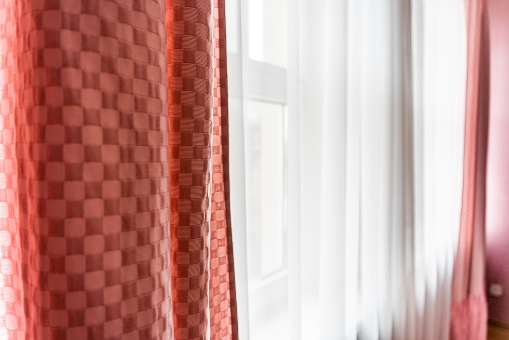 white wooden door with brown curtain