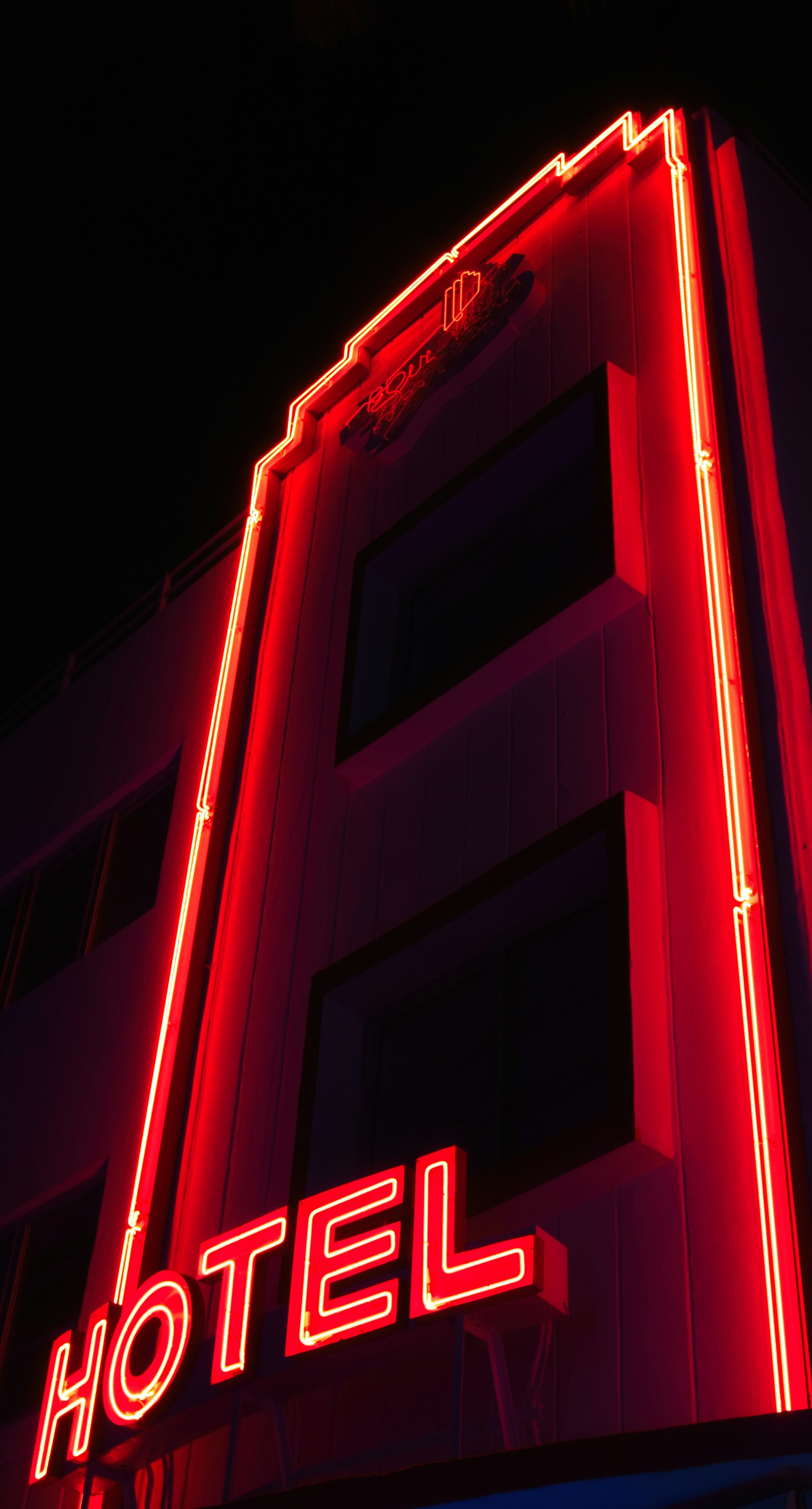 red and black concrete building during nighttime
