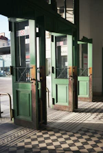 green and brown wooden door