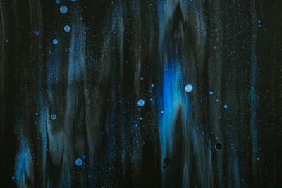 An abstract cosmic scene with swirling bright galaxies on a dark canvas.
