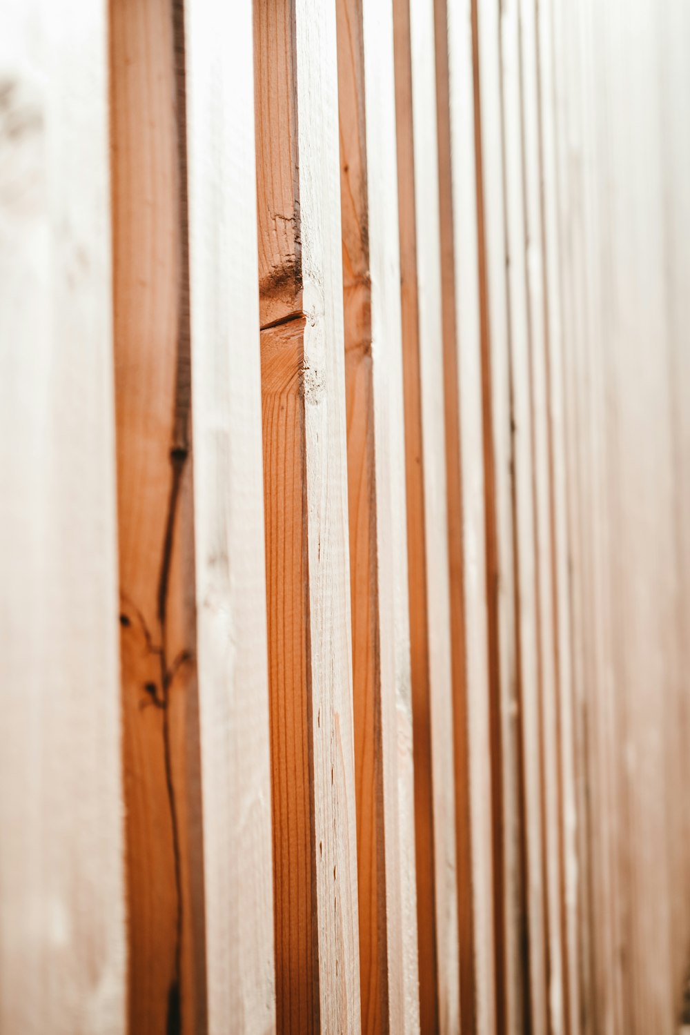 brown wooden fence in close up photography