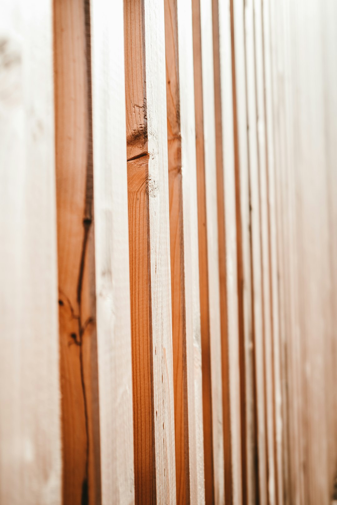 brown wooden fence in close up photography