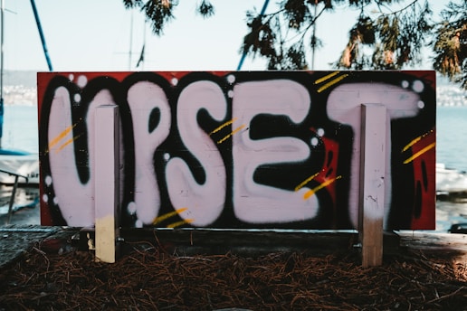 black and white graffiti on wall