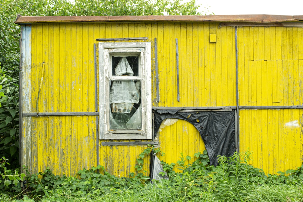 yellow and black wooden house