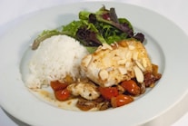 green vegetable on white ceramic plate