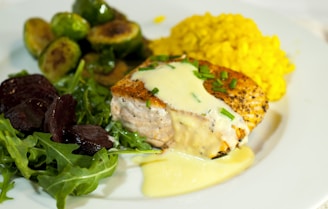 green vegetable on white ceramic plate