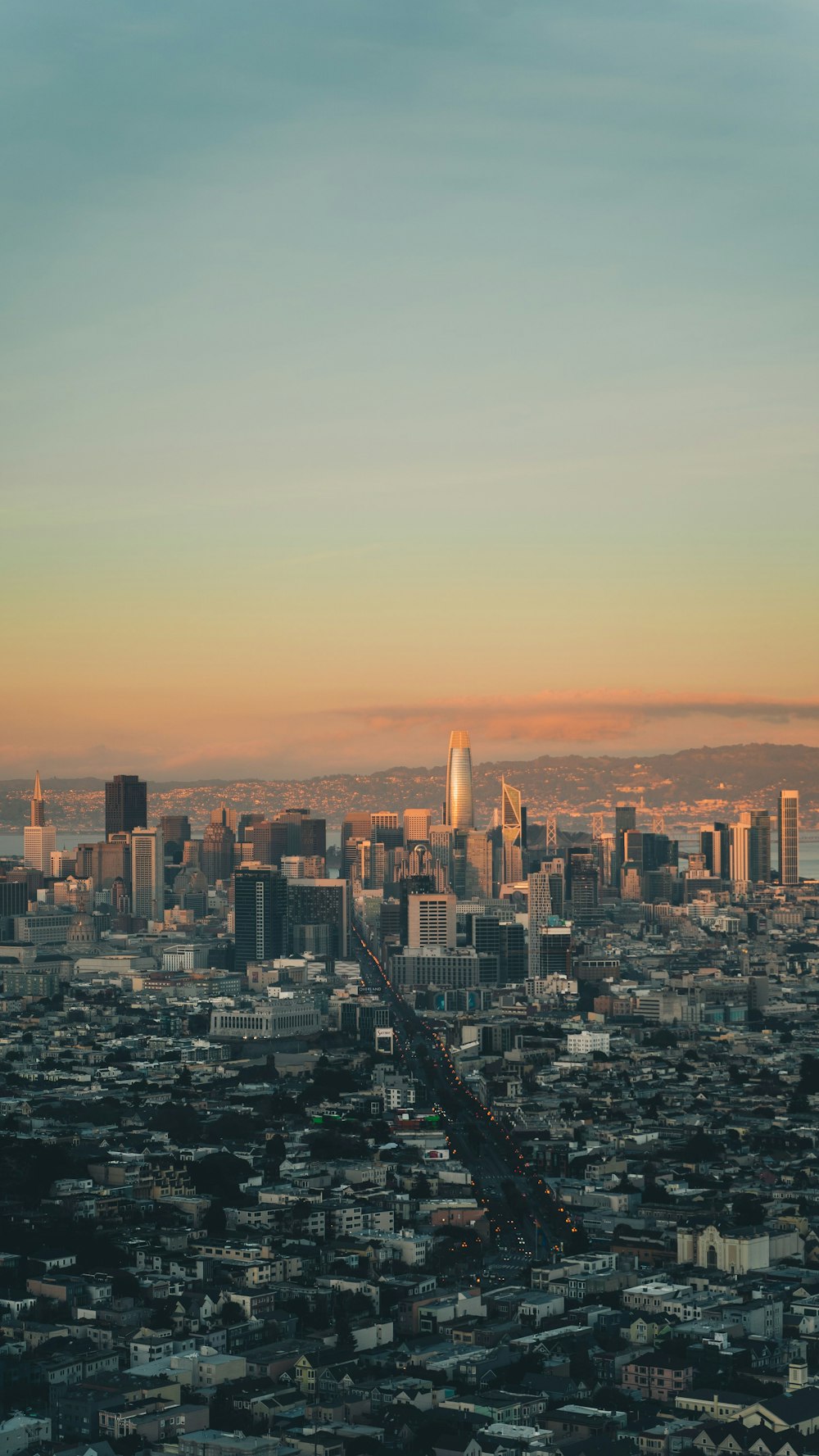 city skyline during orange sunset