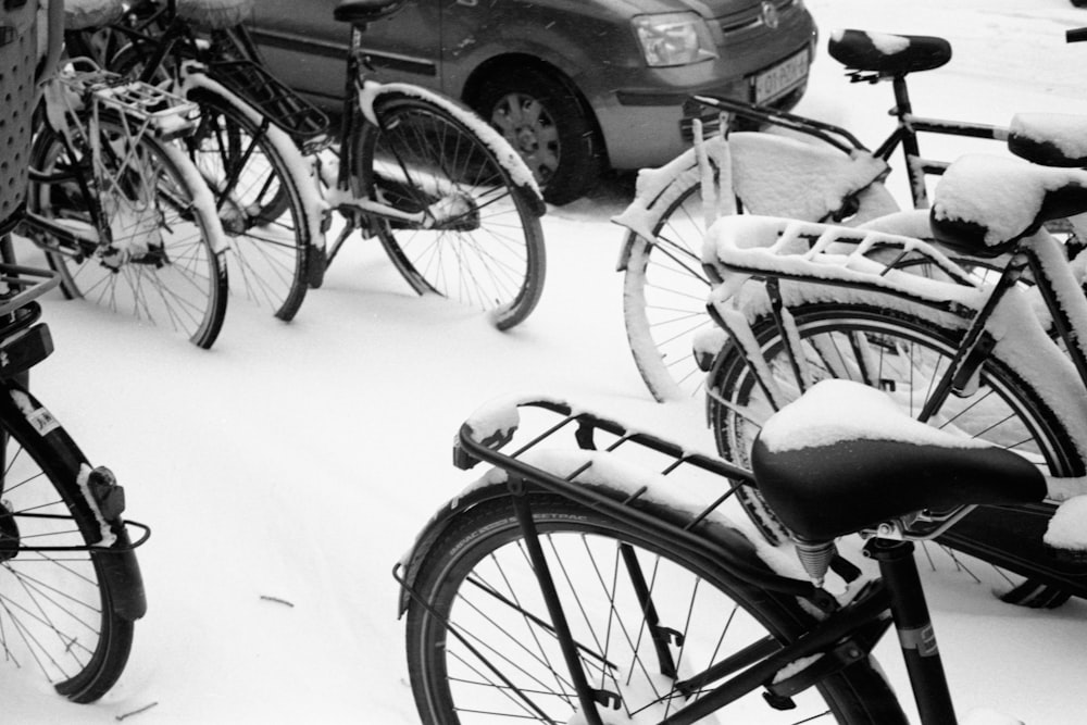 black bicycle on snow covered road