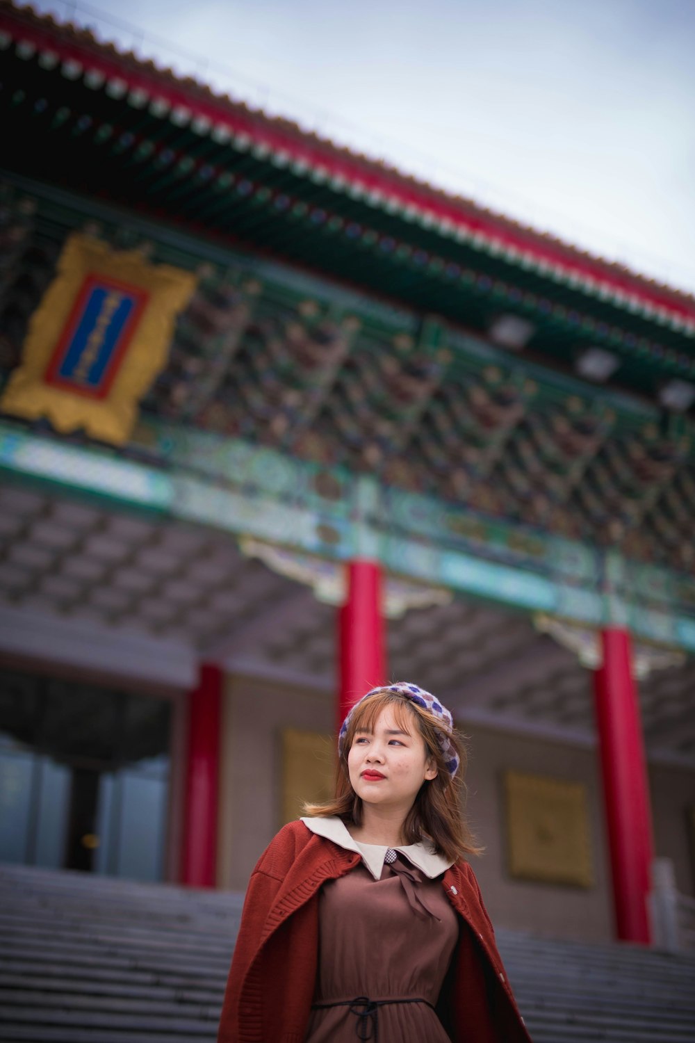 woman in red and white shirt wearing red and white bandana