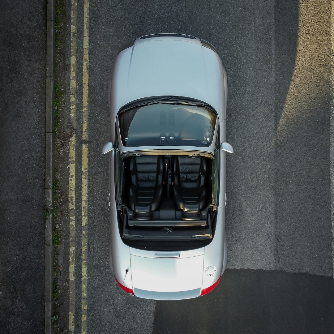 white car on gray asphalt road