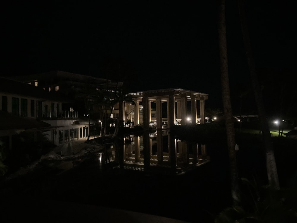 white and brown concrete building during night time