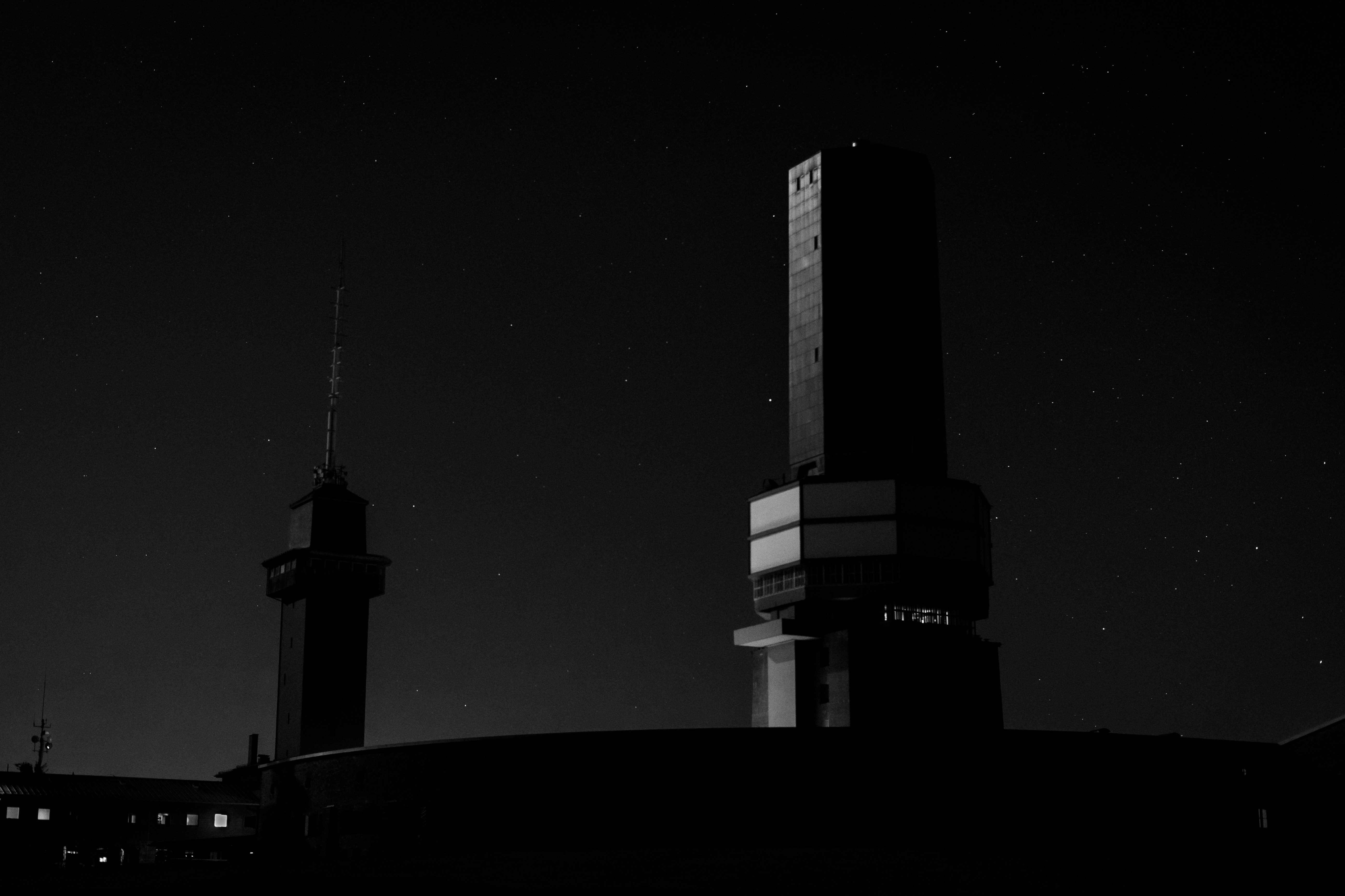 grayscale photo of high rise building