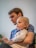 A father engaging with his child while using the educ platform.
