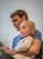 A father engaging with his child while using the educ platform.