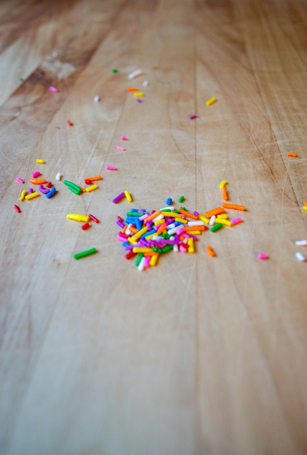 multi color plastic toy on brown textile