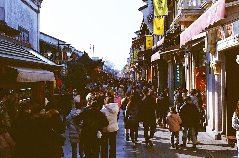 people walking on street during daytime