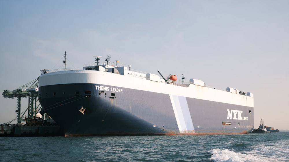 white and black ship on sea during daytime