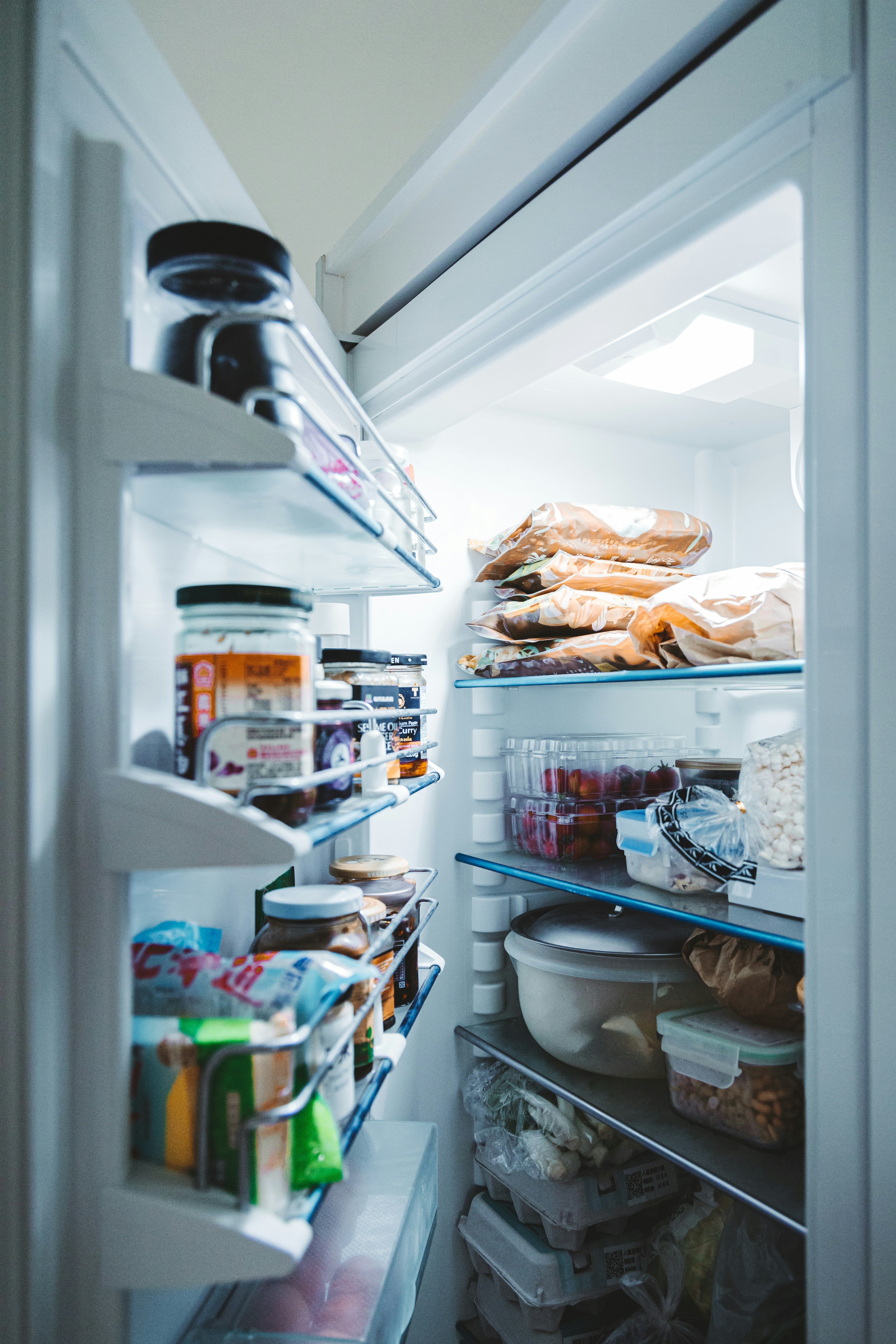 bread in refrigerator with assorted foods