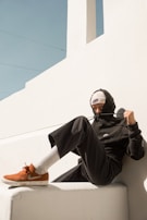 A casual winter look with a comfy hoodie and relaxed-fit pants perfect for chilly days.