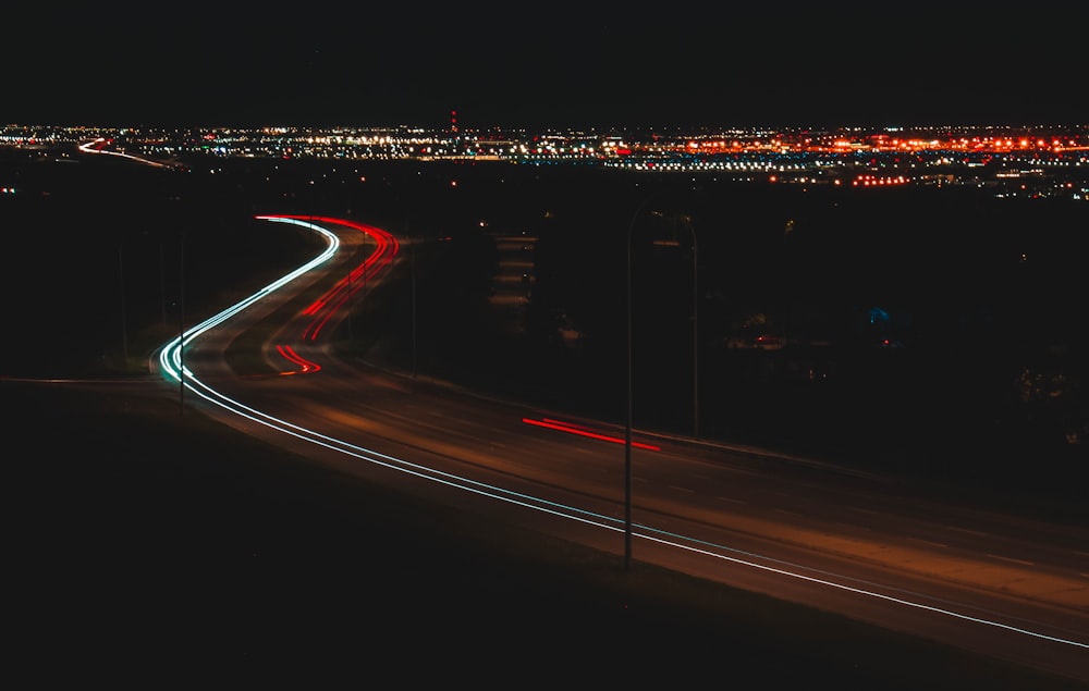 time lapse photography of city lights during night time