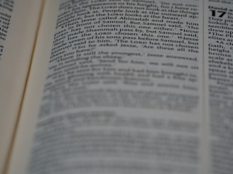 A close-up of a student reading theological texts.