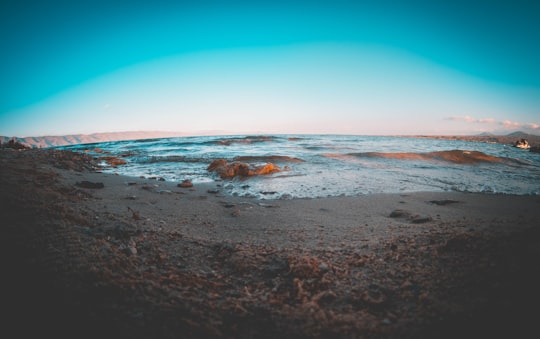 sea waves crashing on shore during daytime in Sevan Armenia