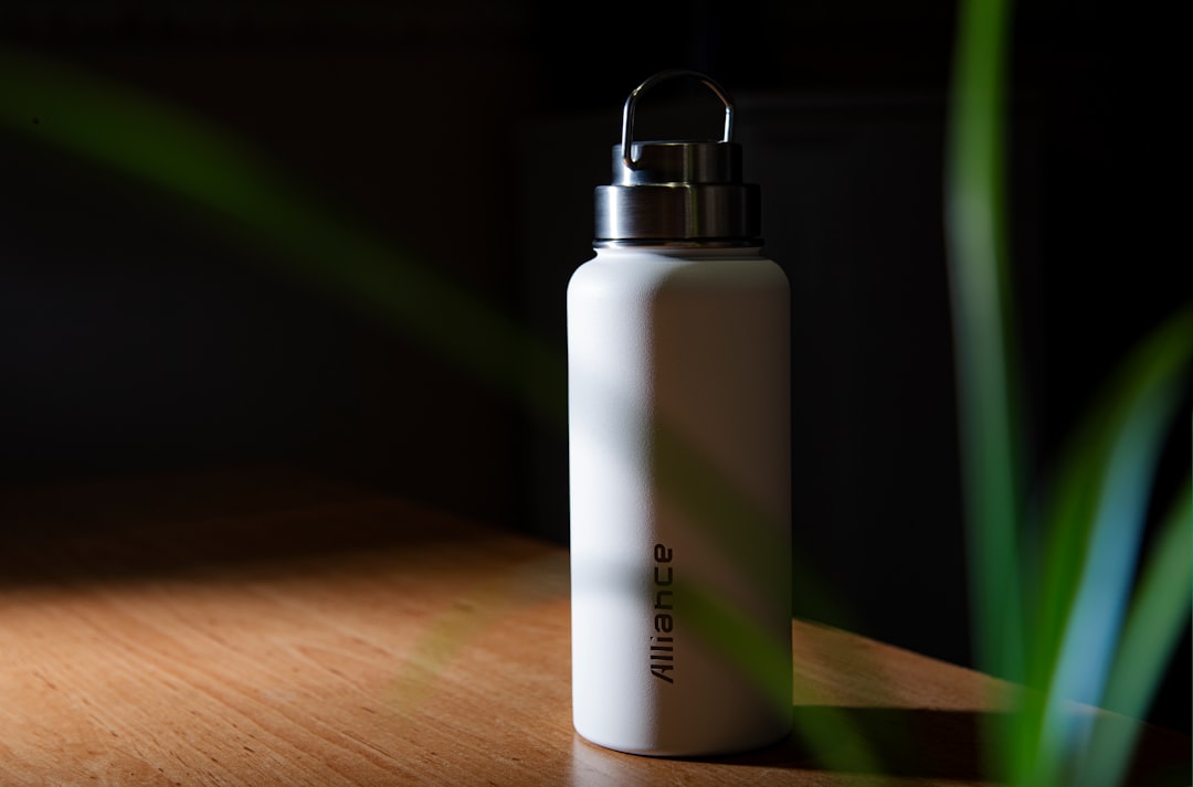 white and black plastic bottle