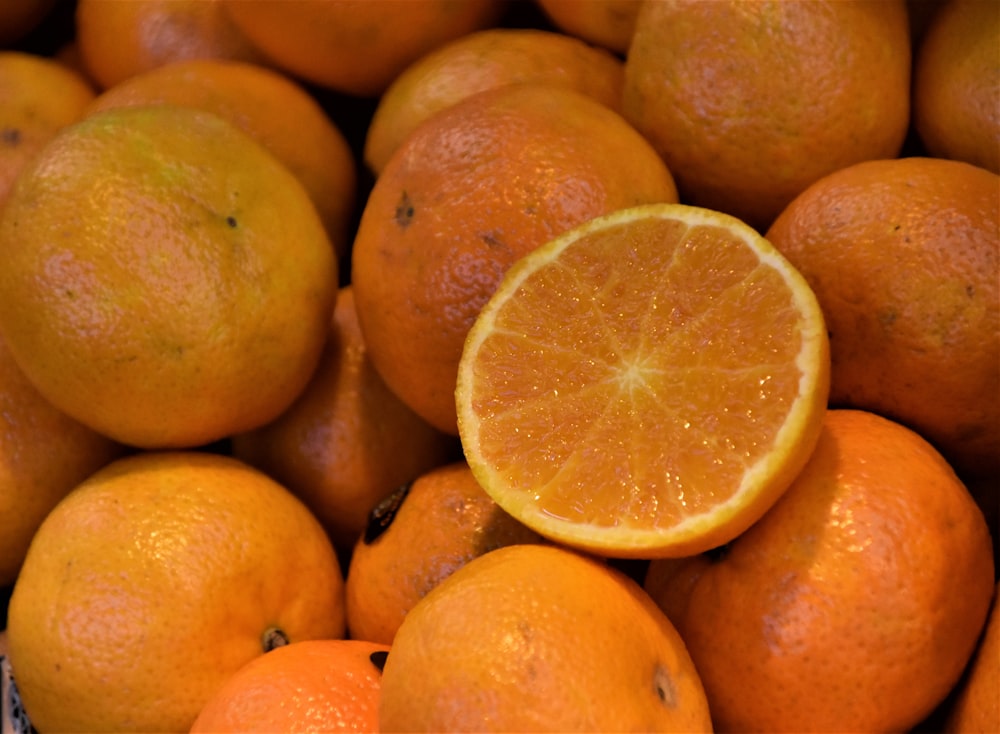 orange fruits on brown wooden table