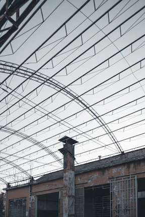 Wide shot of an industrial shed structure showcasing robust metal framework.