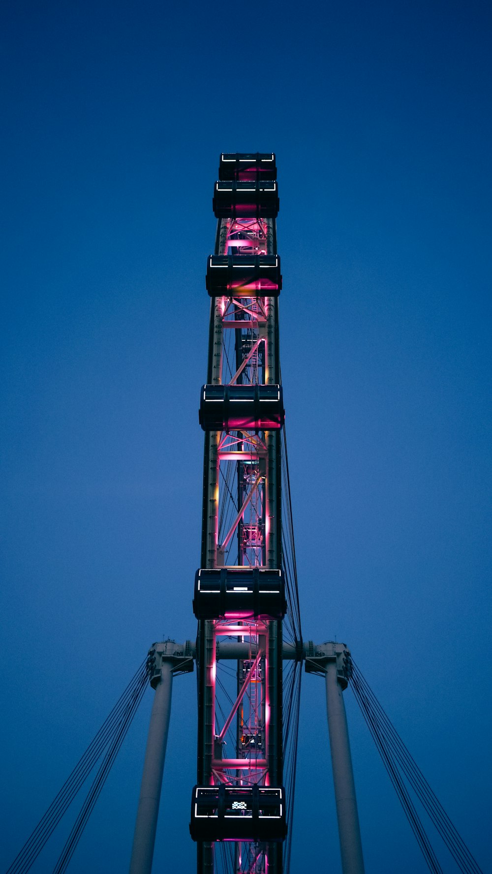 red and black tower under blue sky