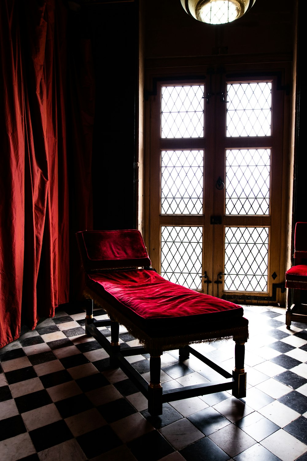 red bed linen on bed