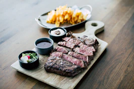 sliced meat on white ceramic plate