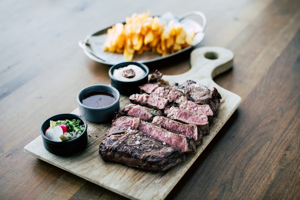 sliced meat on white ceramic plate