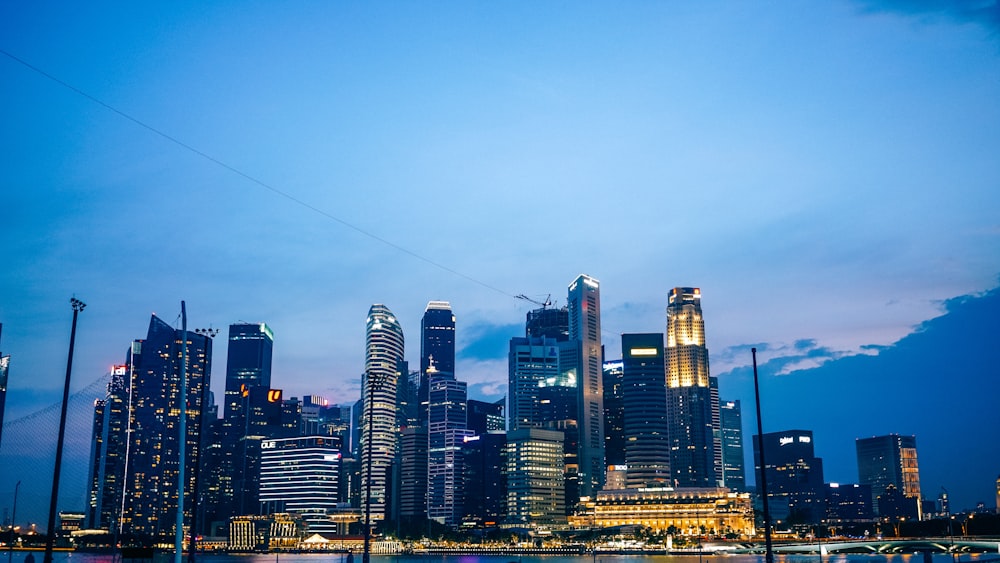 city skyline under blue sky during daytime