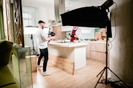 Behind-the-scenes shot of a styled food photo shoot in progress with natural light.