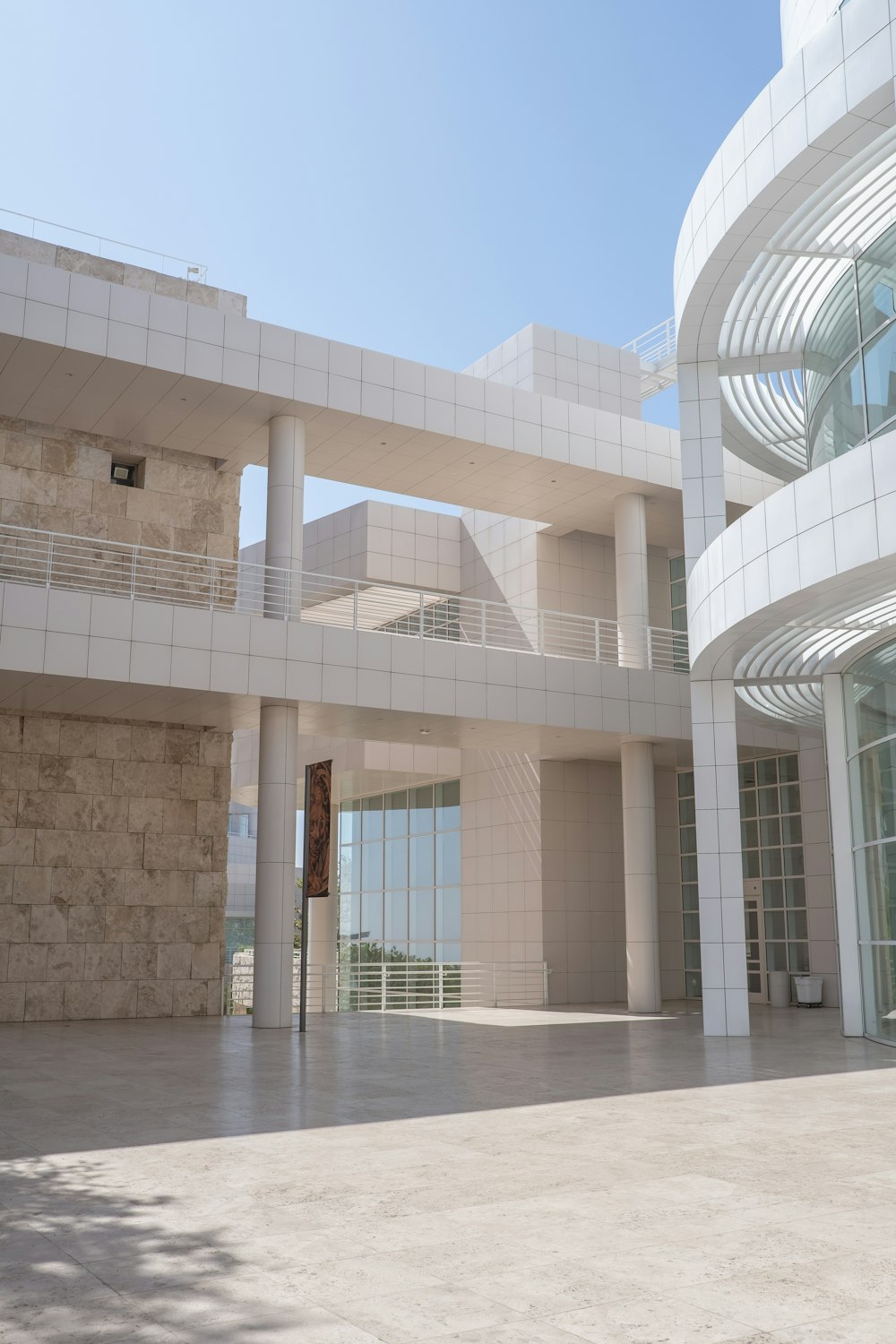 white concrete building under blue sky during daytime