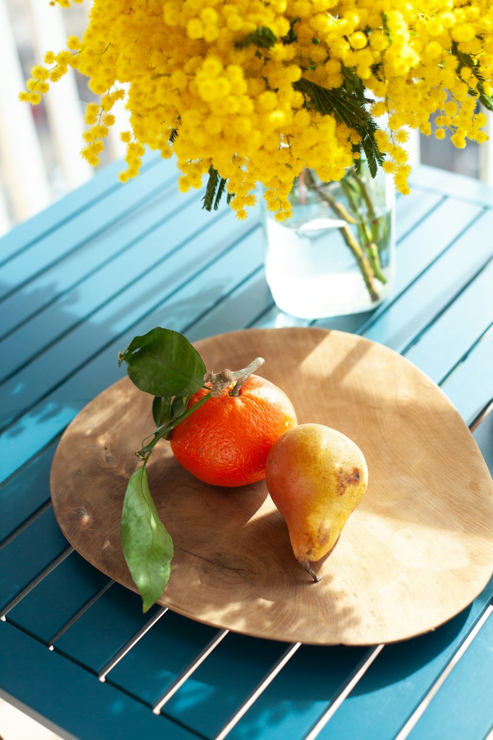 red apple fruit on brown wooden table