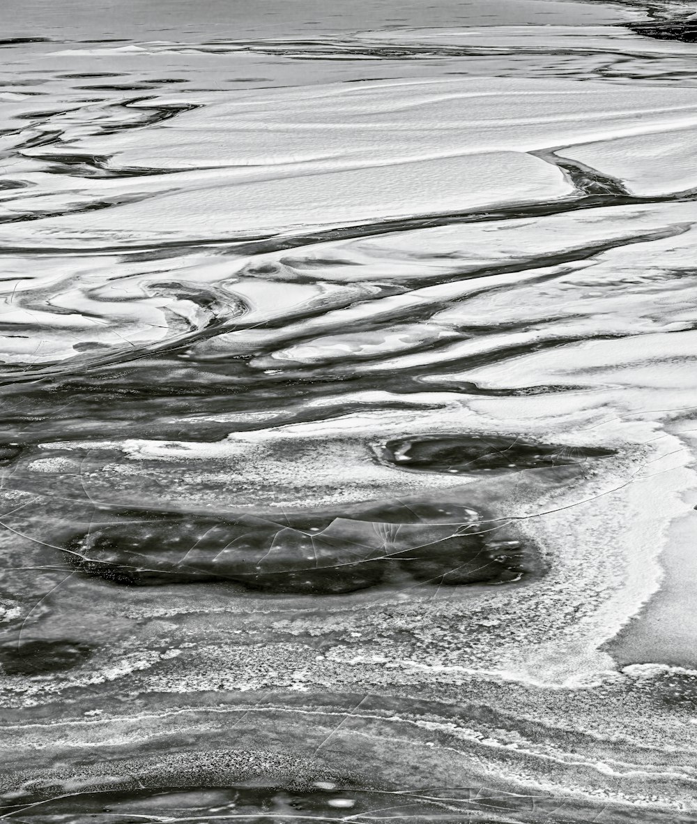 water waves on gray sand