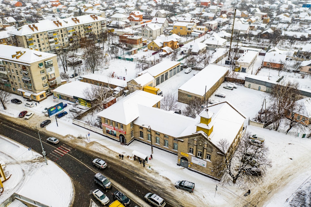 cars parked on street near buildings during daytime