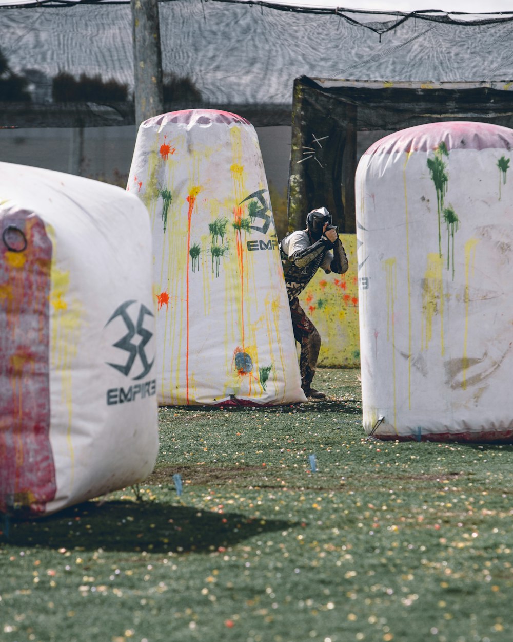 white and black plastic bags on green grass field