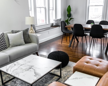 white and black table near white couch