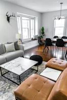 white and black table near white couch